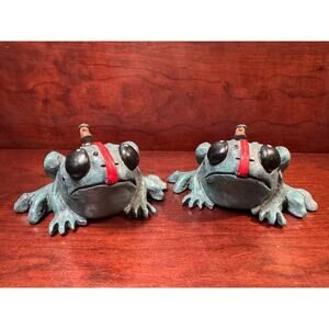 Set of 2 Whimsical Frog Figurines By Dedo Fly Has Tongue Nailed To His Back